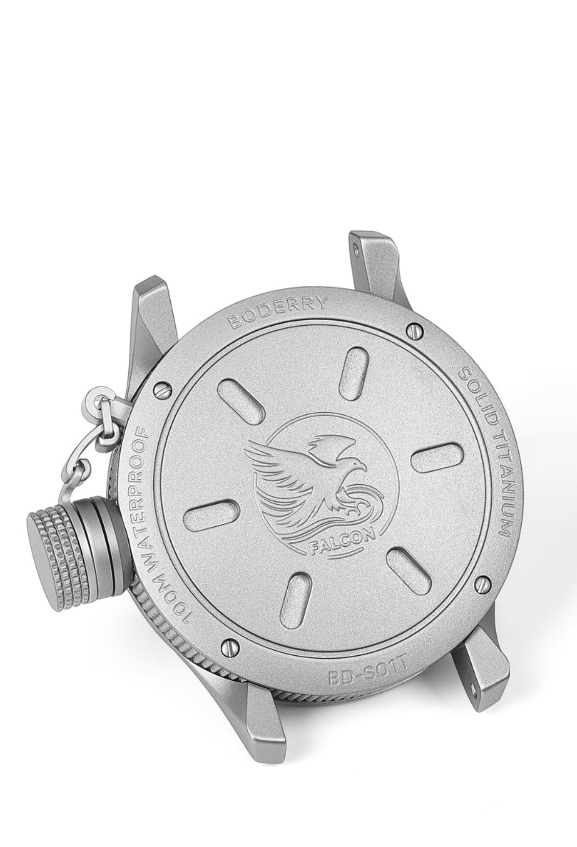 Solid titanium caseback of the Boderry Falcon, engraved with a falcon and the words solid titanium and 100m waterproof
